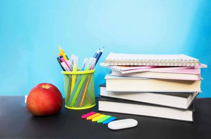 stationery-apple-books-on-a-blue-background-2023-11-27-05-11-21-utc (1)